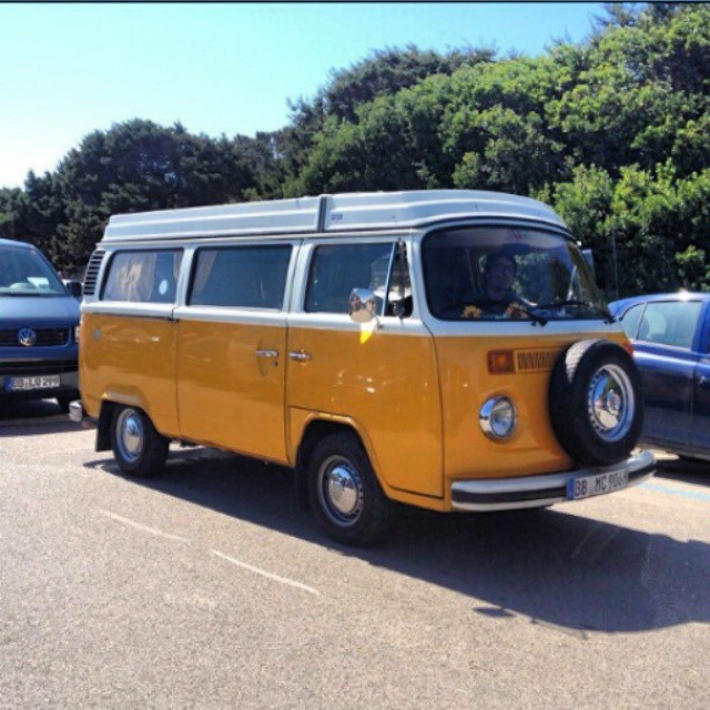 German registered Westfalia Bay bus. Stintino beach.