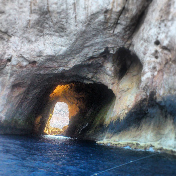 Cave. Boat. Diving. Snorkeling. Sardinia.